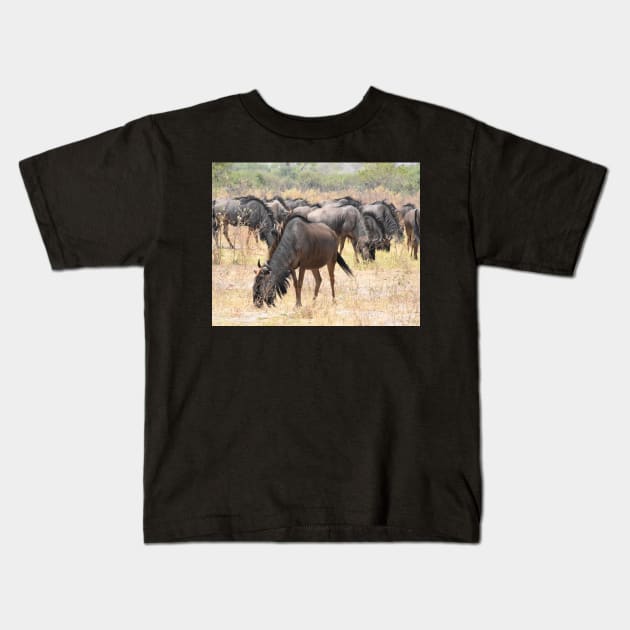 A herd of Wildebeest Kids T-Shirt by Steves-Pics